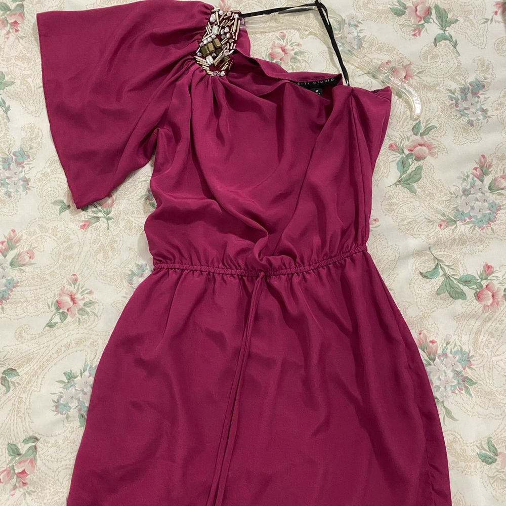 large, one shoulder dress